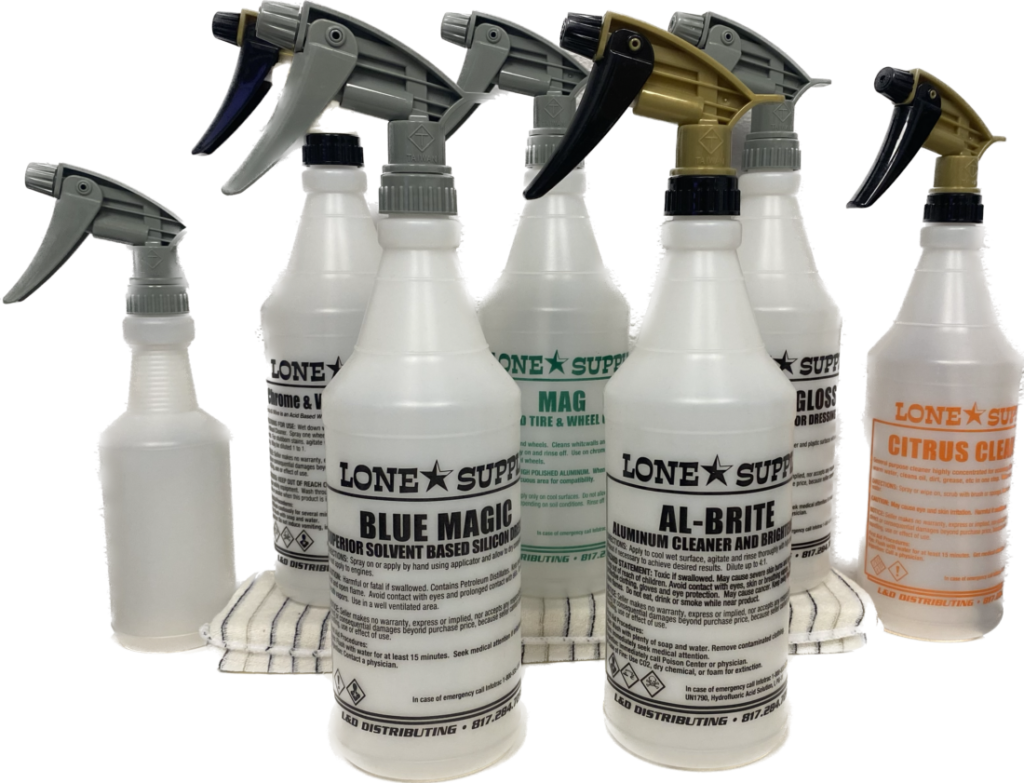 Bottles of Lone Star cleaning products with spray nozzles in different colors.