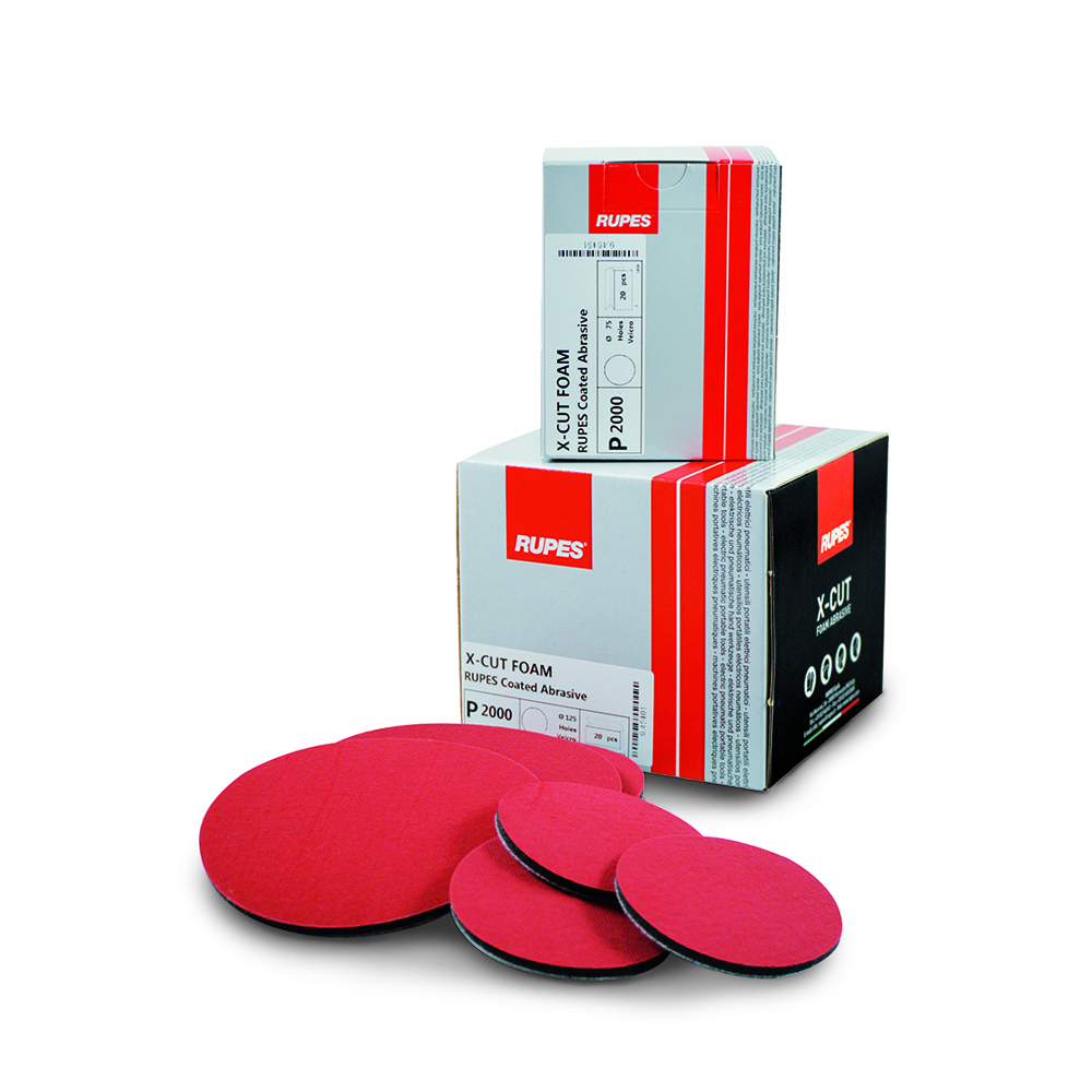 Red abrasive discs packaged with white and red boxes.