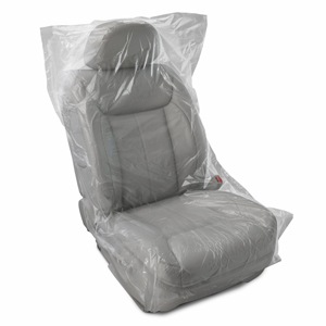 Car seat covered in clear plastic protective wrap.