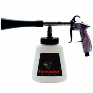 A black and purple Tornador cleaning tool with a white container.