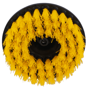 Top view of a circular brush with yellow bristles.