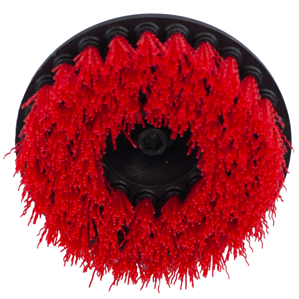 Red circular brush attachment with dense bristles.