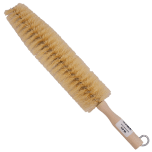 A beige bottle brush with a wooden handle.
