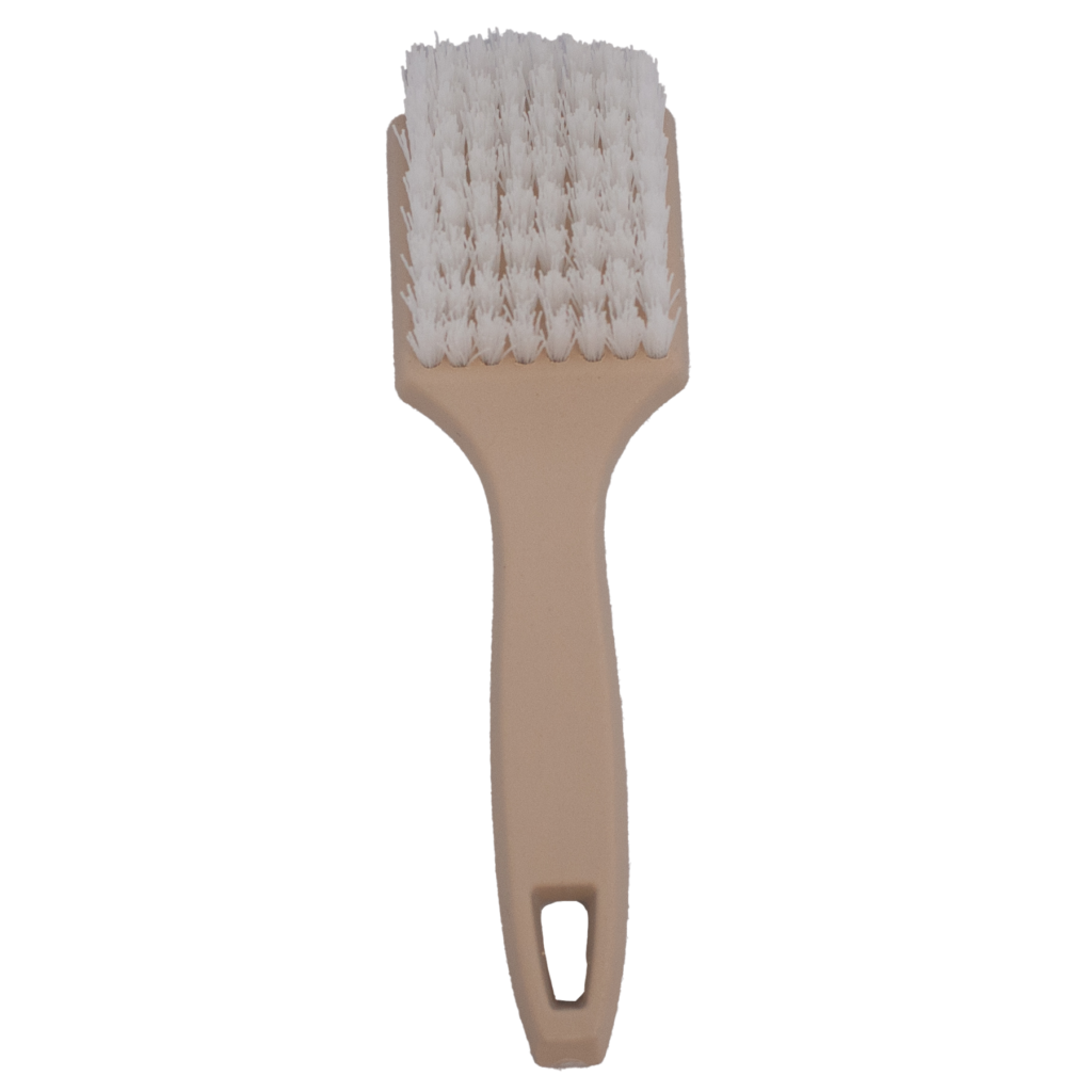 A beige plastic brush with white bristles and a handle.