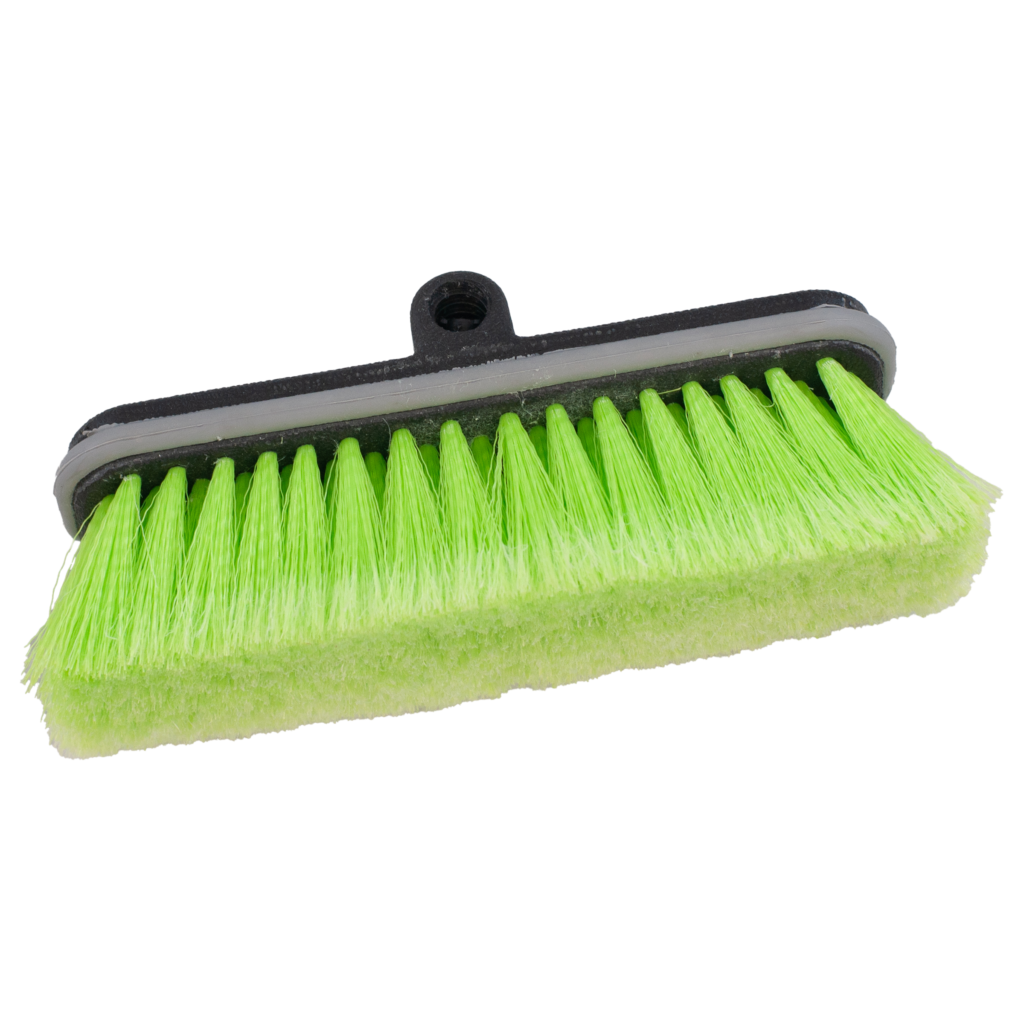 A green bristle broom with a black handle.
