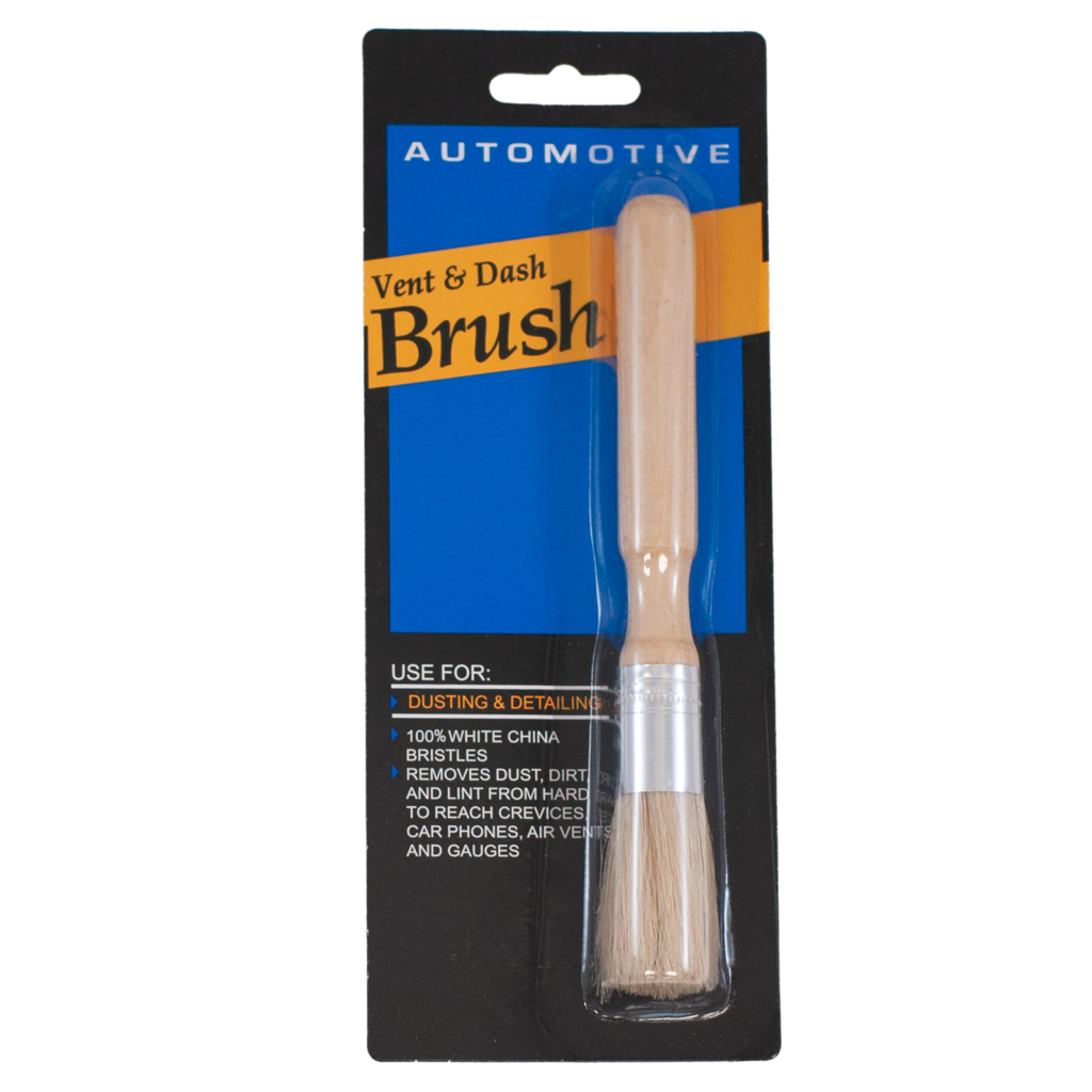 A packaged automotive vent and dash brush with a beige handle.