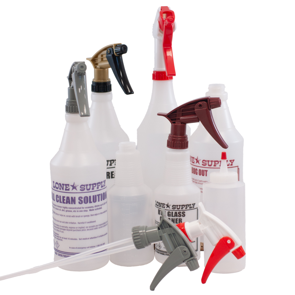 Various spray bottles with different colored nozzles for cleaning or gardening.