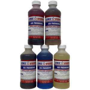 Five bottles of different colored inks labeled for screen printing.