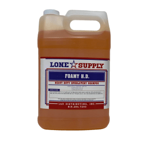 A gallon jug of Lone Supply Foamy B.L. cleaner with a handle and label.