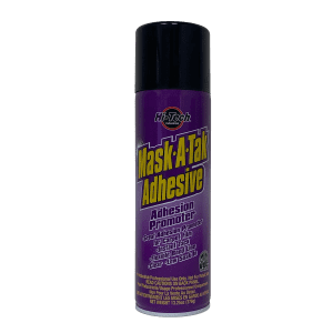 Spray adhesive can for masking and general use with a purple and black label.